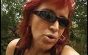 Xfamster: Mature redhead blowing cock in the backyard
