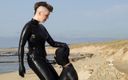Lady Valeska femdom: Strap on Sucking at the Ocean